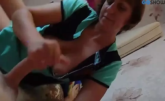 Eager mature housewife provides a sensual blowjob and handjob for her horny lover